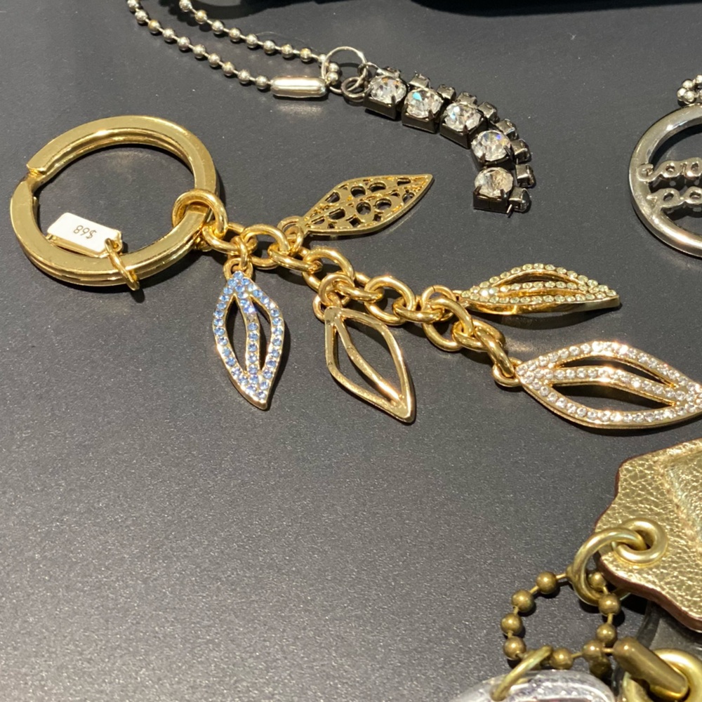 Coach rhinestone leaf fob